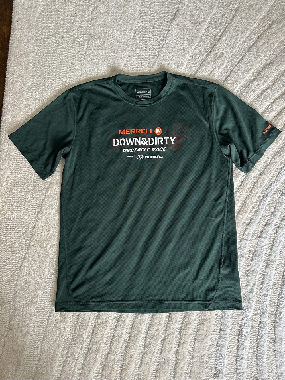 Merrell Men's Dark Green Down & Dirty Obstacle Race Tee with Orange Logo